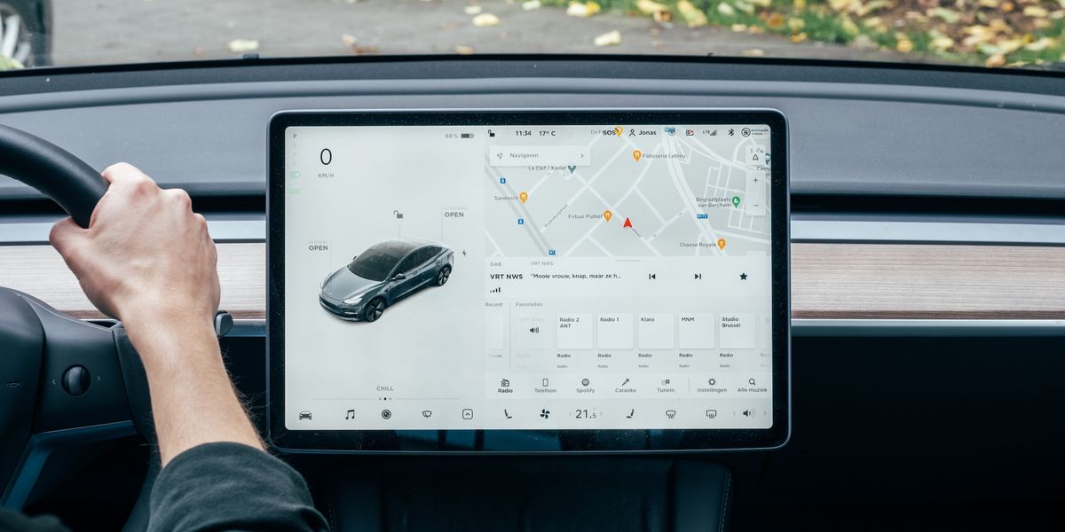 Dashboard of a Tesla Model 3, a fully electric vehicle with autopilot features