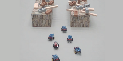 A new control mechanism allows teams of robots (above) to calculate the tradeoffs of maintaining a communication network and move through difficult terrain, including narrow hallways. (Credit: REACT Lab/Harvard SEAS) 