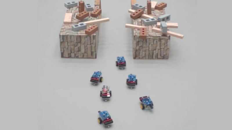 A new control mechanism allows teams of robots (above) to calculate the tradeoffs of maintaining a communication network and move through difficult terrain, including narrow hallways. (Credit: REACT Lab/Harvard SEAS) 