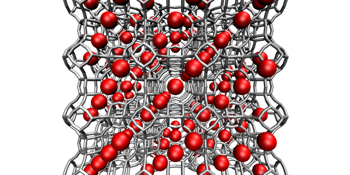 A conceptual illustration of a porous crystalline material. The red spheres represent voids where CO2 might collect. Credit: NIST