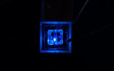 Efficiency upgrade for OLED screens: A route to blue PHOLED longevity