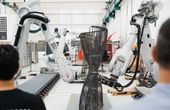 Robots assemble reinforcing steel