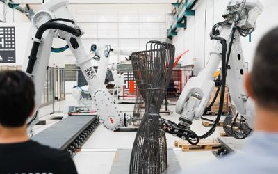 Robots assemble reinforcing steel