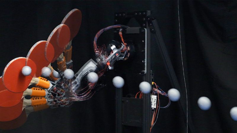 Time lapse photos show a new ping-pong-playing robot performing a top spin. The robot quickly estimates the speed and trajectory of an incoming ball and precisely hits it to a desired location on the table. Credit: Courtesy of the researchers