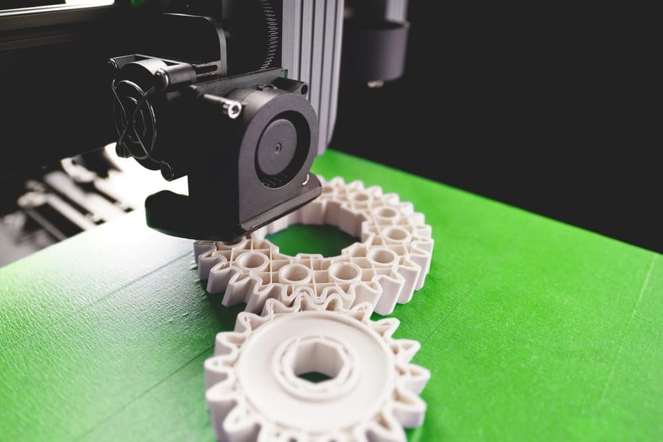 Gears 3D printed on green print bed