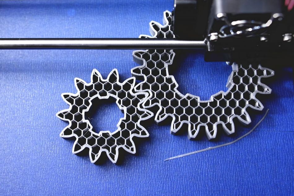 3D printed gears with infill on blue tape