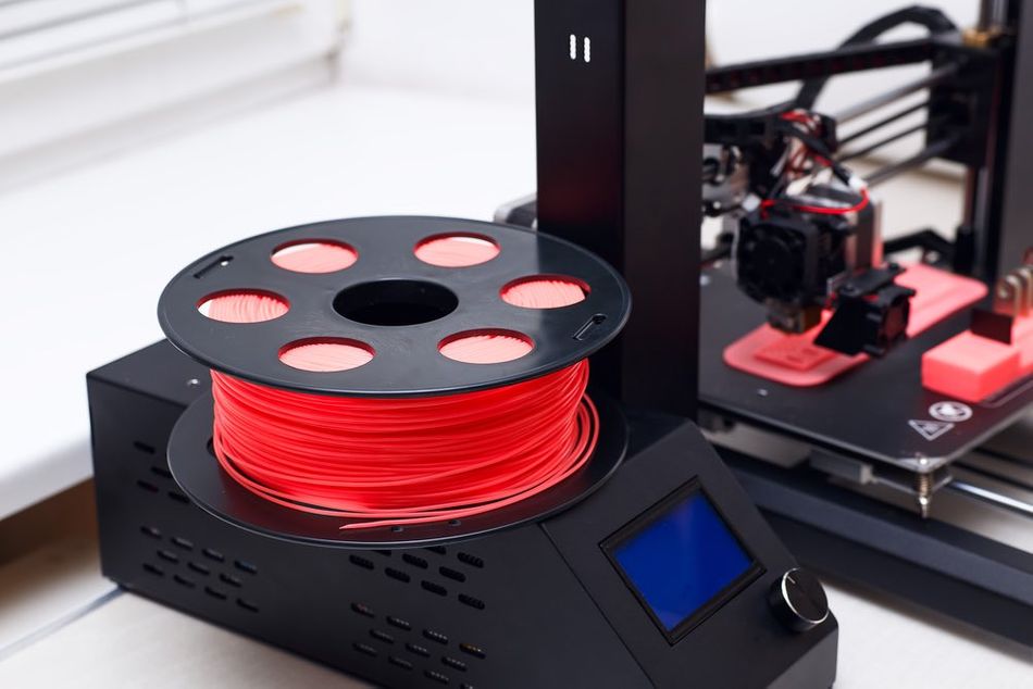 Red spool Filament and 3D printer