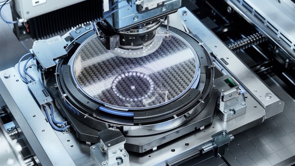 A silicon wafer inside a photolithography machine