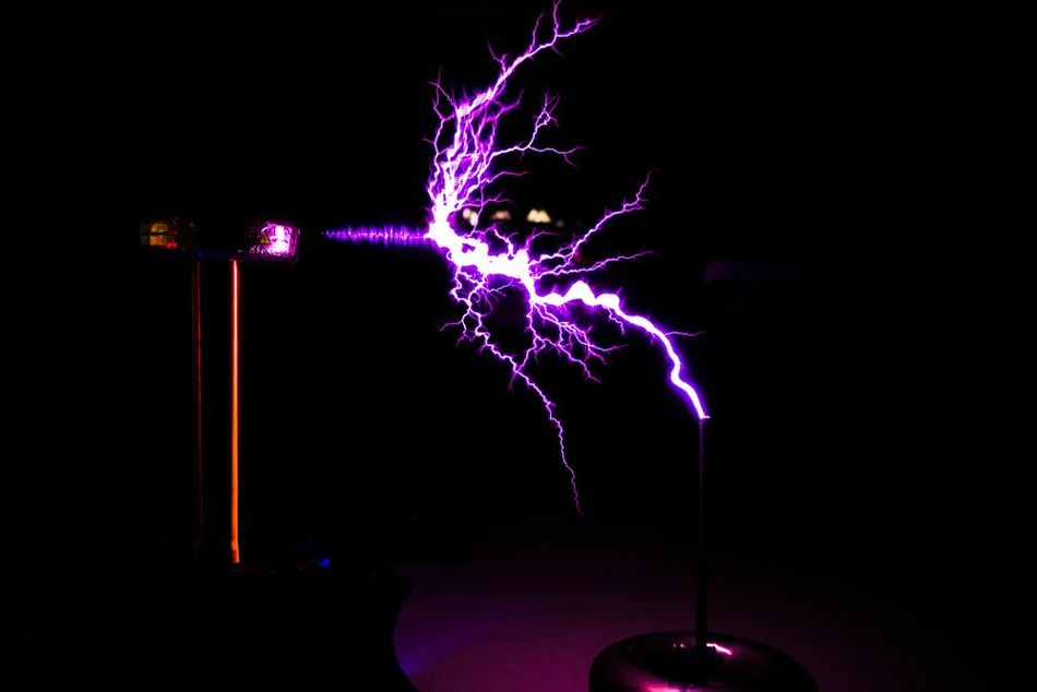 Tesla coil in operation with high energy lightning strikes