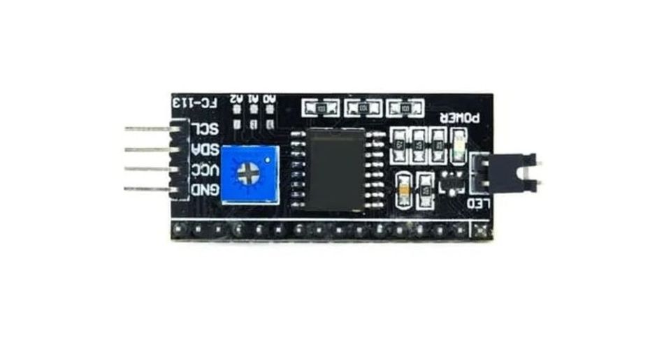 An I2C board with GND, VCC, SDA, SCL wiring scheme