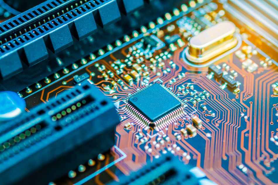 Copper traces, vias and holes visible on the CPU chipset of PCB