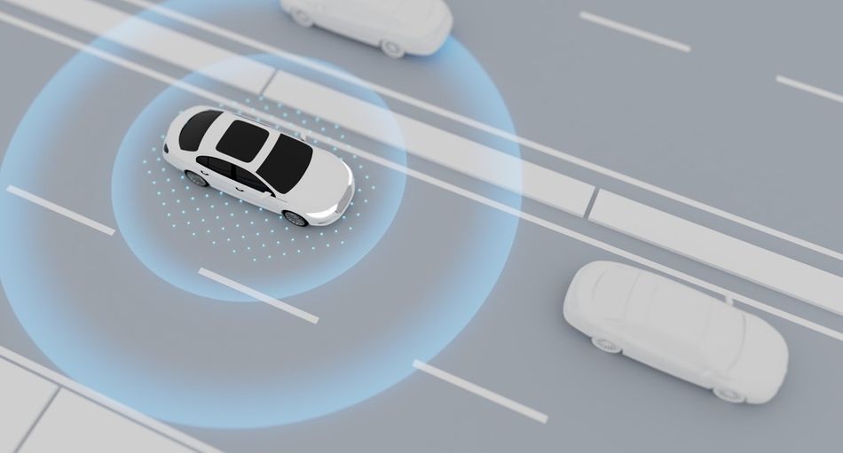 An illustration of an autonomous car using LIDAR to detect obstacles
