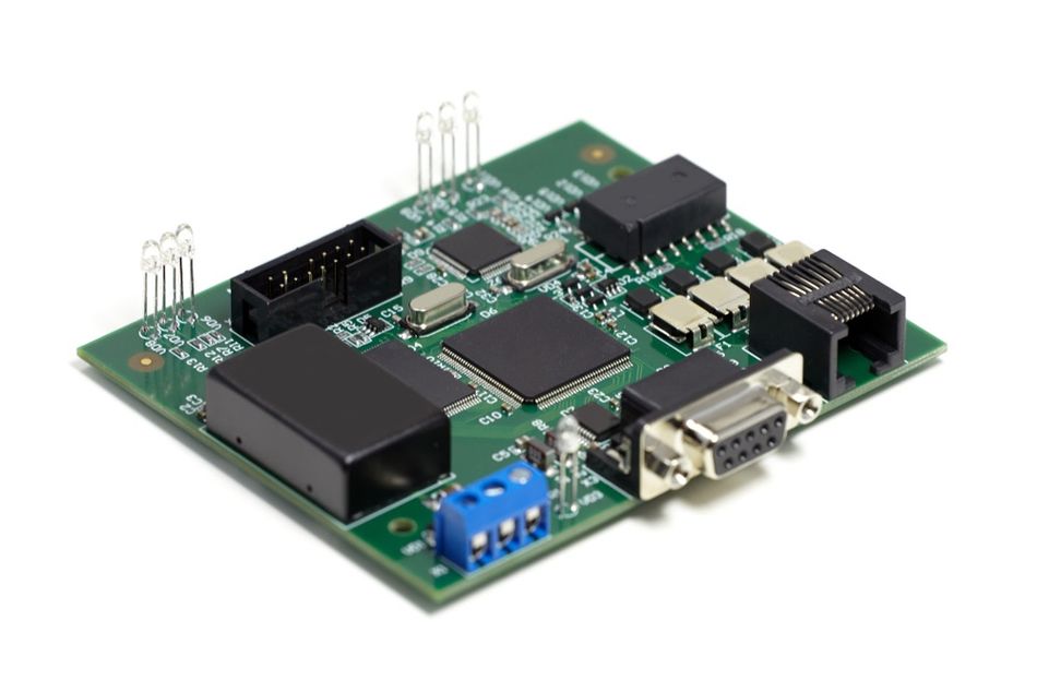 A circuit card assembly featuring PCB elements, electronic components, and connectors