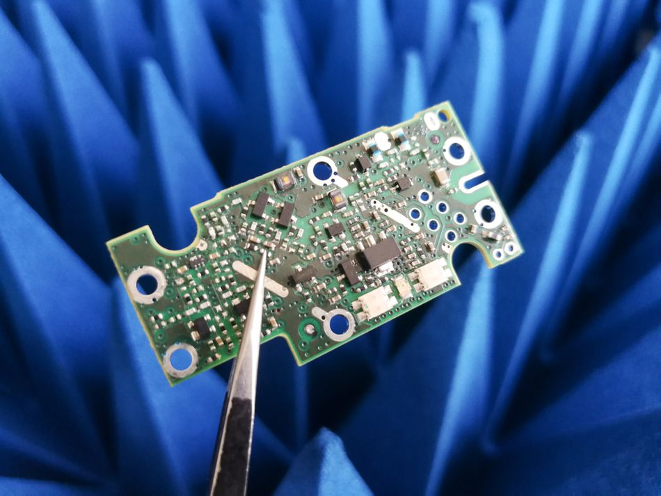 Electronics PCB in front of Electromagnetic compatibility measurement absorbers