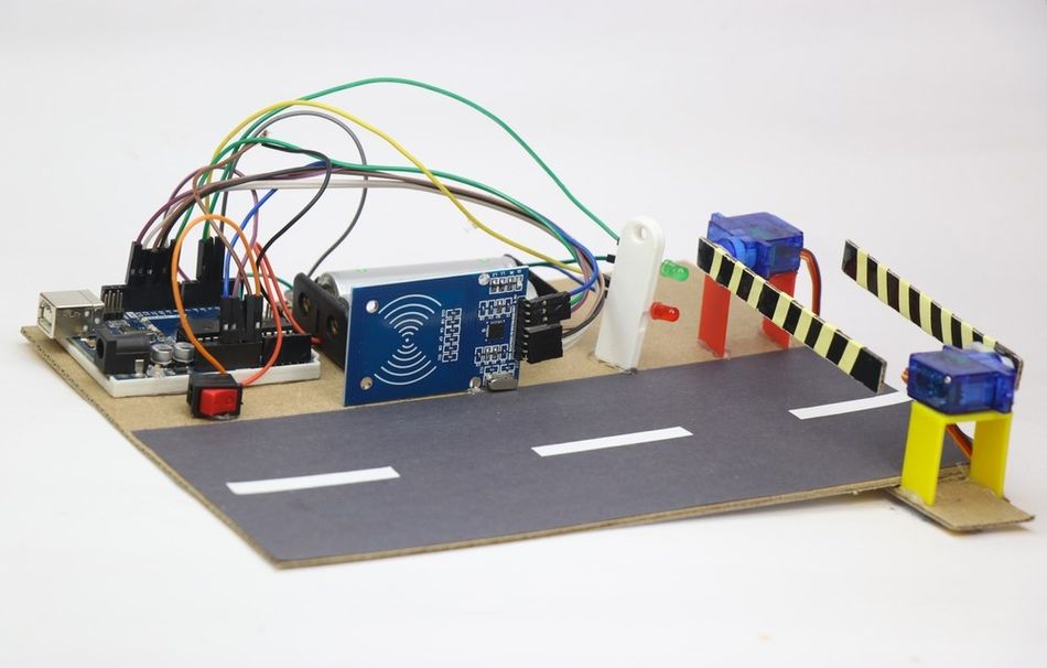 Prototype of Automatic Toll Collection System using RFID Sensor, Arduino and Servo