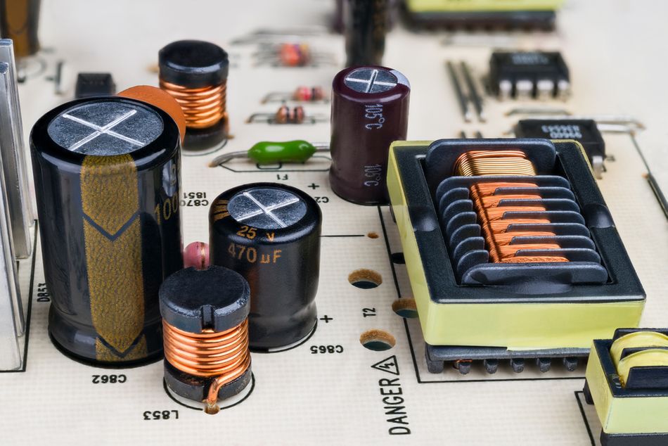 Capacitors, Inductors and Rectangular Transformer with protruding insulation grooves in a Digital System