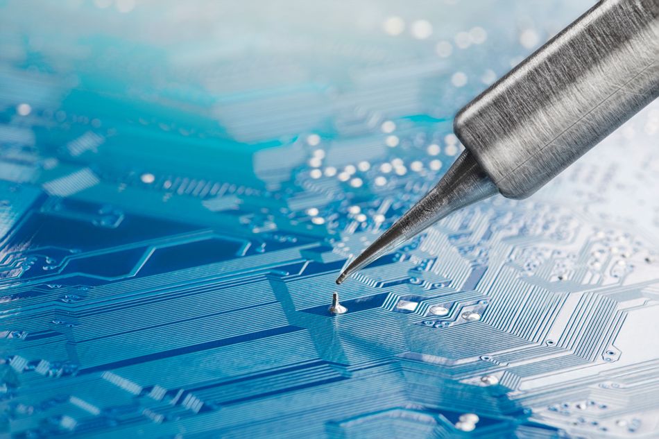 Soldering the Electronic Components onto the PCB using a Soldering Iron