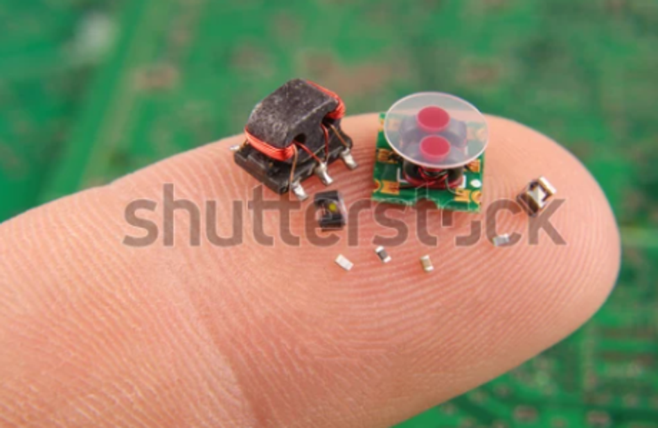 An RF balun transformer is small than a fingertip