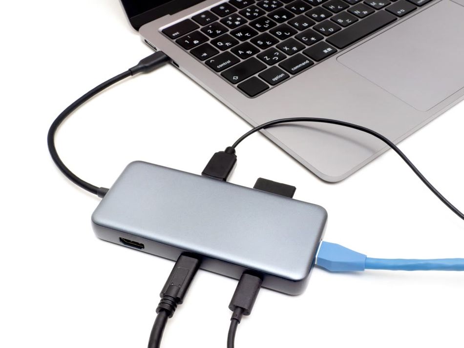 A USB Hub connected to a laptop via USB-C cable
