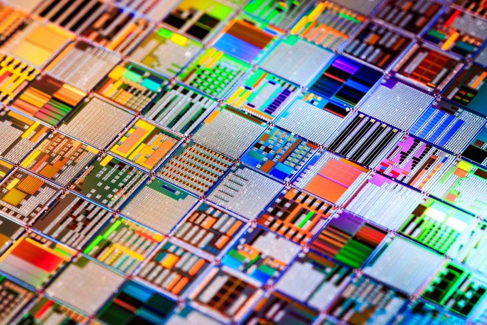 Close-up view of a silicon semiconductor wafer, showcasing its smooth surface profile, essential for integrated circuit fabrication and microelectronics manufacturing.