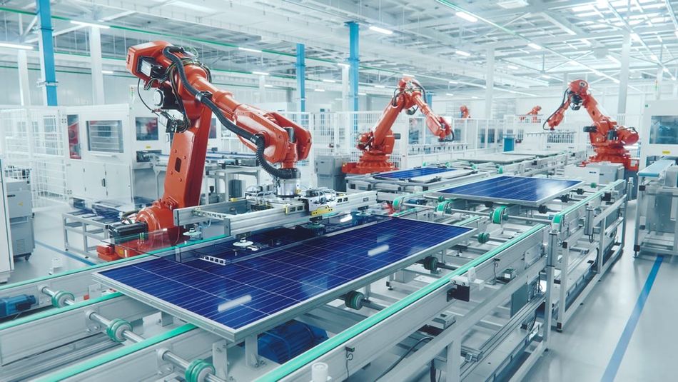 A modern robotic assembly line manufacturing solar panels
