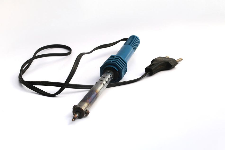 A blackened solder tip due to oxidization