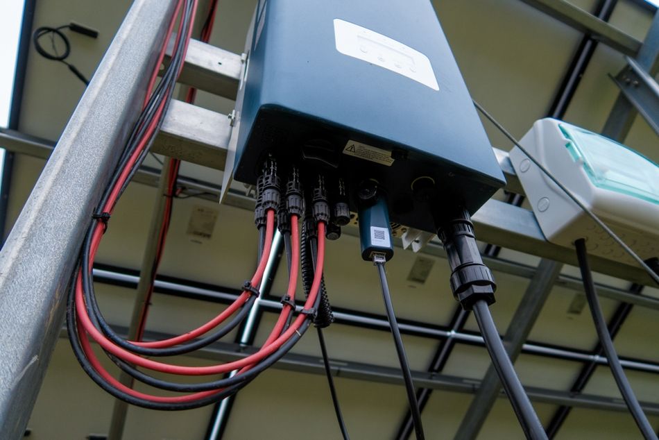 A three-phase inverter drawing power from a solar power system