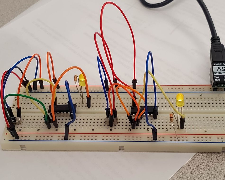 A typical setup of a Full Adder using integrated circuits on a breadboard