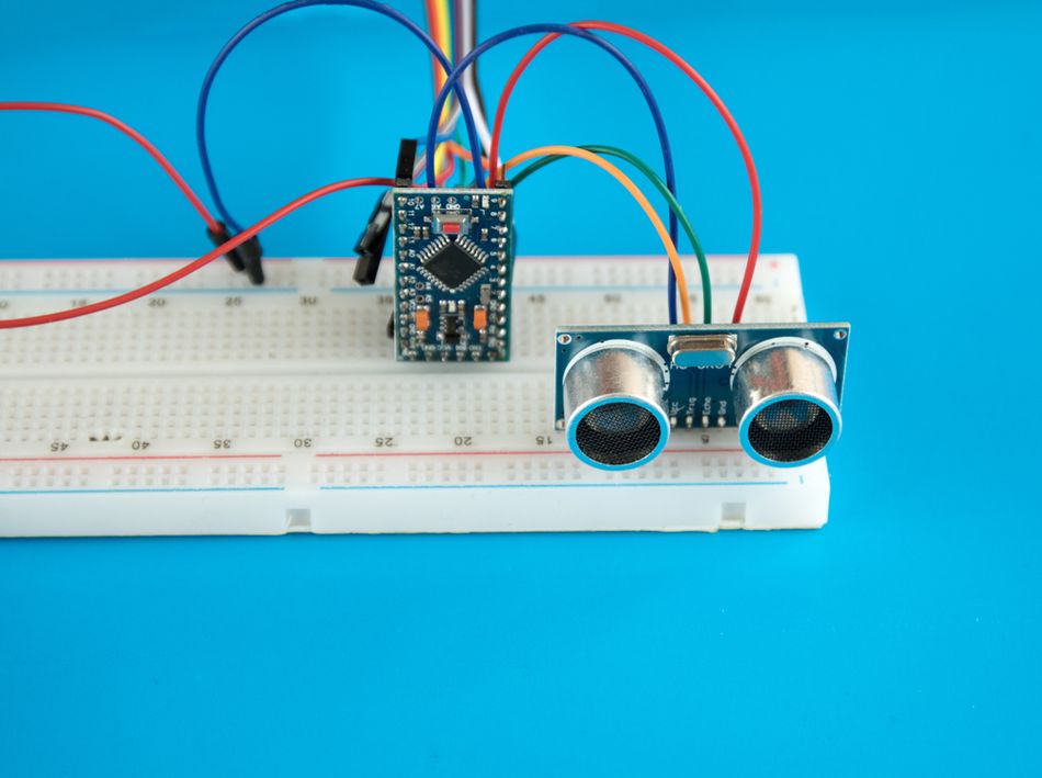 Arduino Nano interfaced with an Ultrasonic sensor via digital and PWM pins