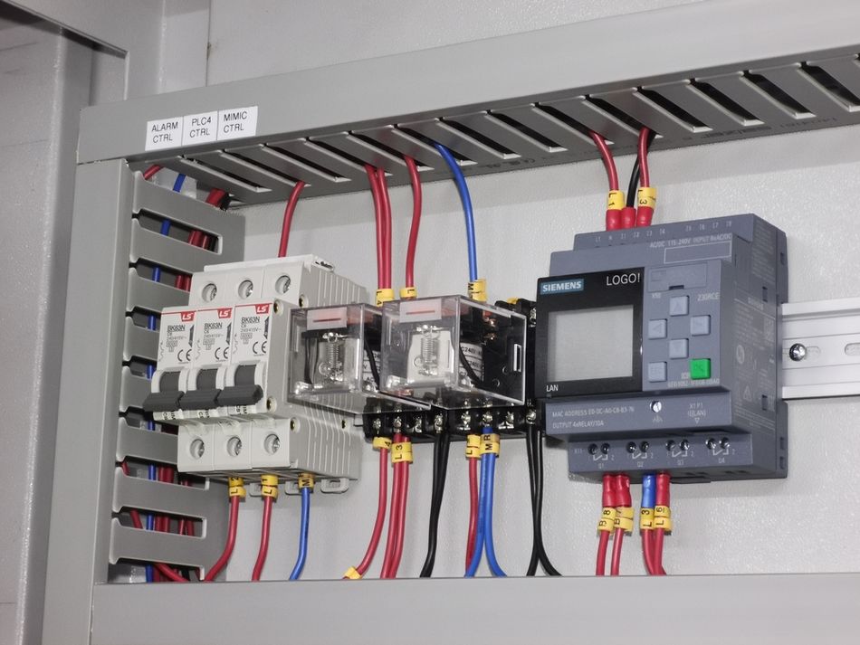 PLC interfaced with relays in a water treatment system
