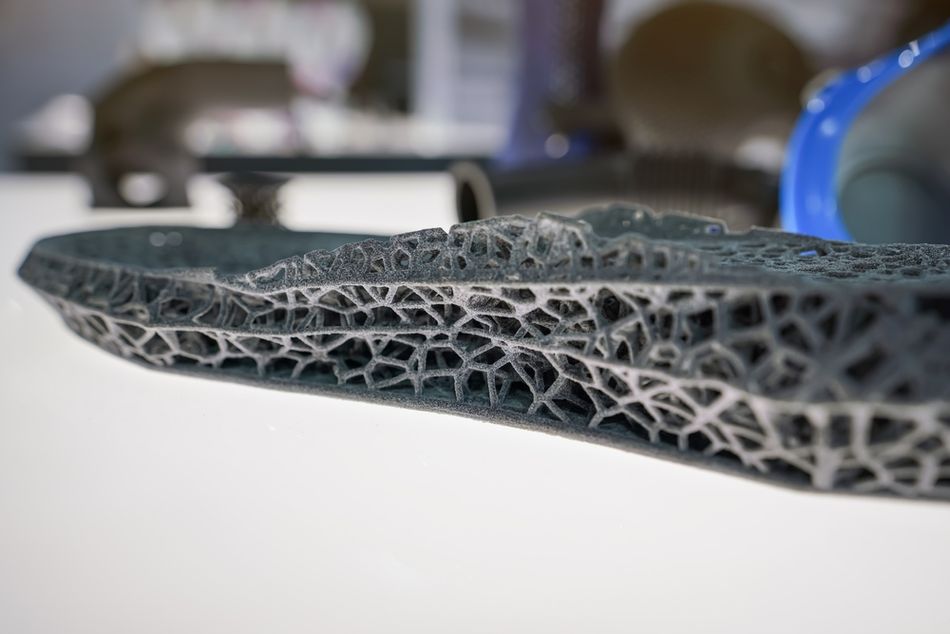 A 3D printed footwear component made using generative design.