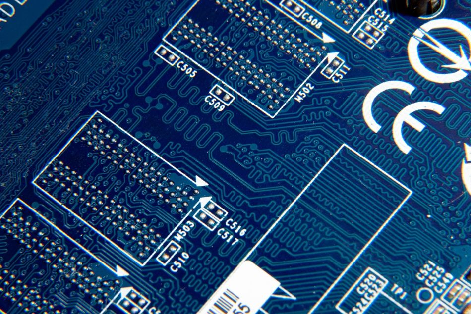Blue Electronic Printed Circuit Board with BGA Elements Assembled