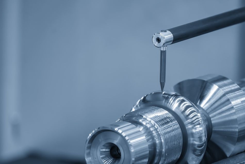 A profilometer measures the surface of a turned metal part