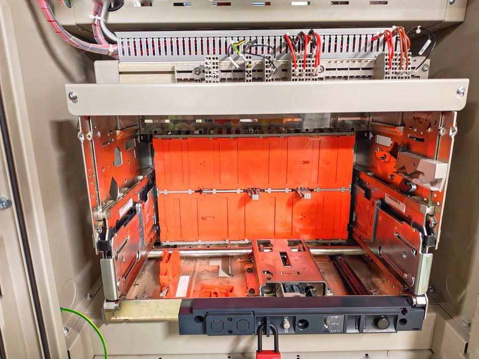 Inspecting Open Draw-Out Compartments of an Industrial MCC Switchgear Cabinet
