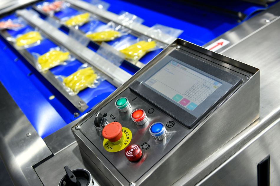 Control Panel of an Industrial Machine in Food Packaging Lines