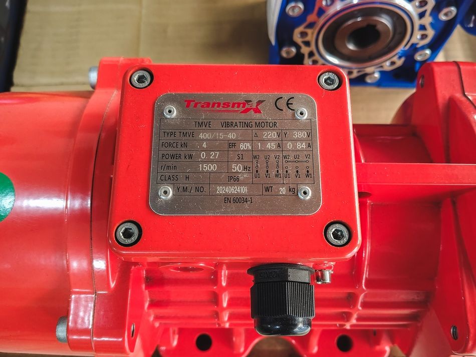 Red Industrial Vibrating Motor with Technical Nameplate